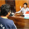 Pelaku pemerkosaan terhadap anak tirinya saat dimintai keterangannya oleh petugas di Mapolres Kuningan.