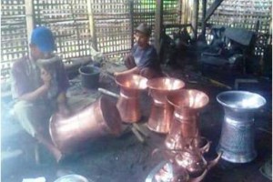 Pengrrajin dandang tembaga